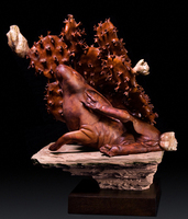 Enfolded Cottontail  Original Wood Sculpture 2017 - © Ken Newman Sculptures 2026