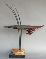 Hang Time - Mixed Media S'more wood with copper on stone. 2014 - © Ken Newman Sculptures 2026